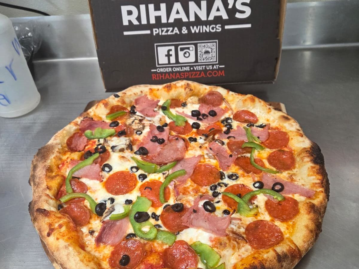 The Supreme — Pepperoni · ham · green peppers · olives at Rihana's Pizza & Wings, North Phoenix