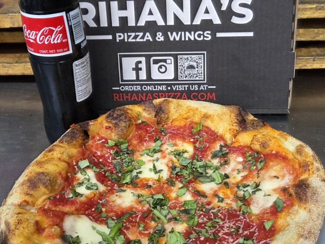 Margherita — Crushed tomato · fresh mozzarella · basil at Rihana's Pizza & Wings, North Phoenix